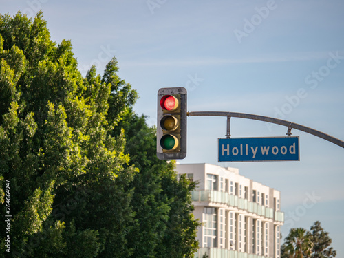 Hollywood Blvd street sign on traffic light at intersection at Los Angeles