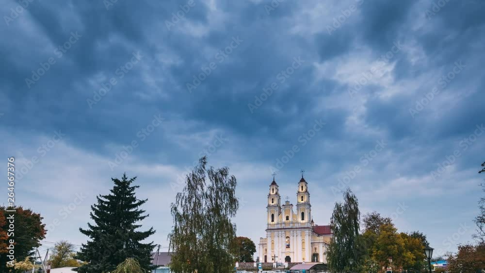 Hlybokaye Or Glubokoye, Vitebsk Region, Belarus. Church Of Sts. Trinity In Evening Lighting Hlybokaye Or Glubokoye, Vitebsk Region, Belarus. Church Of Sts. Trinity In Evening Lighting