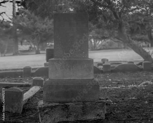 Put your name here. Halloween composition with tombstone in black and white with space for copy 