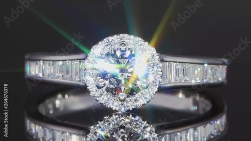 Diamond ring on a black background close-up.