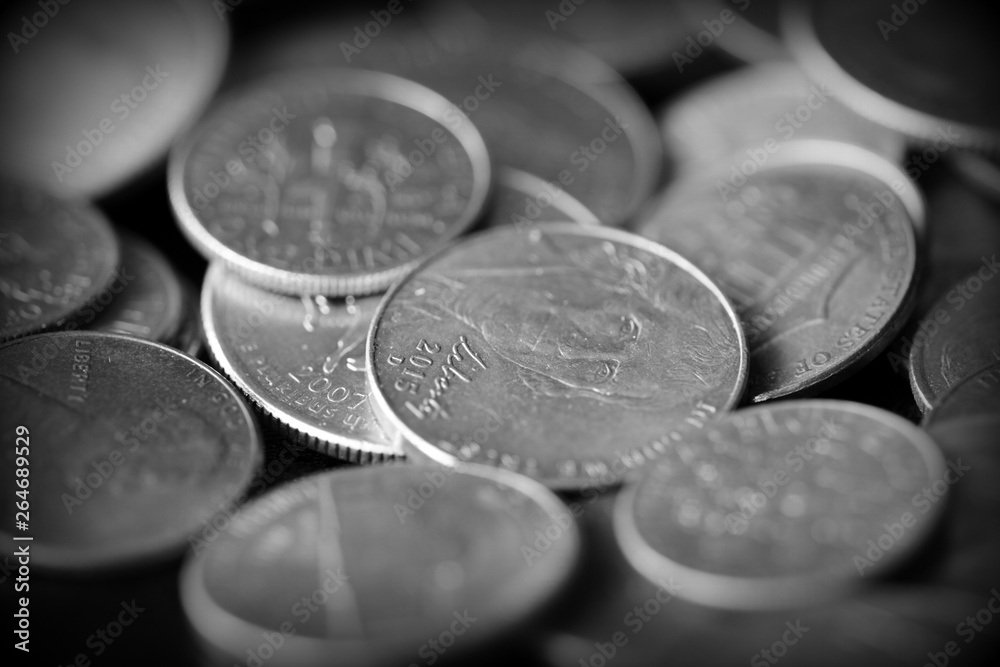 American cents on a dark background close up. Black amd white American cents on a dark background close up. Black amd white