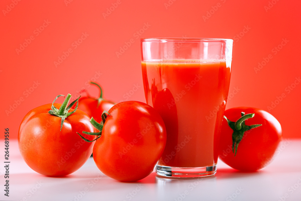 Fresh tomato juice on white table. Healthy drink, food concept. Fresh tomato juice on white table. Healthy drink, food concept.