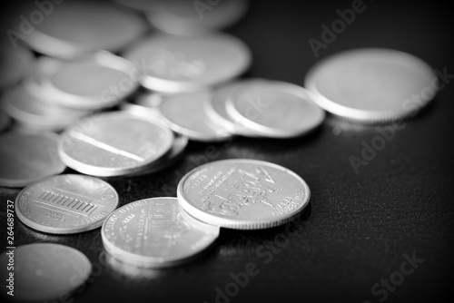 American cents on a dark background close up. Black amd white