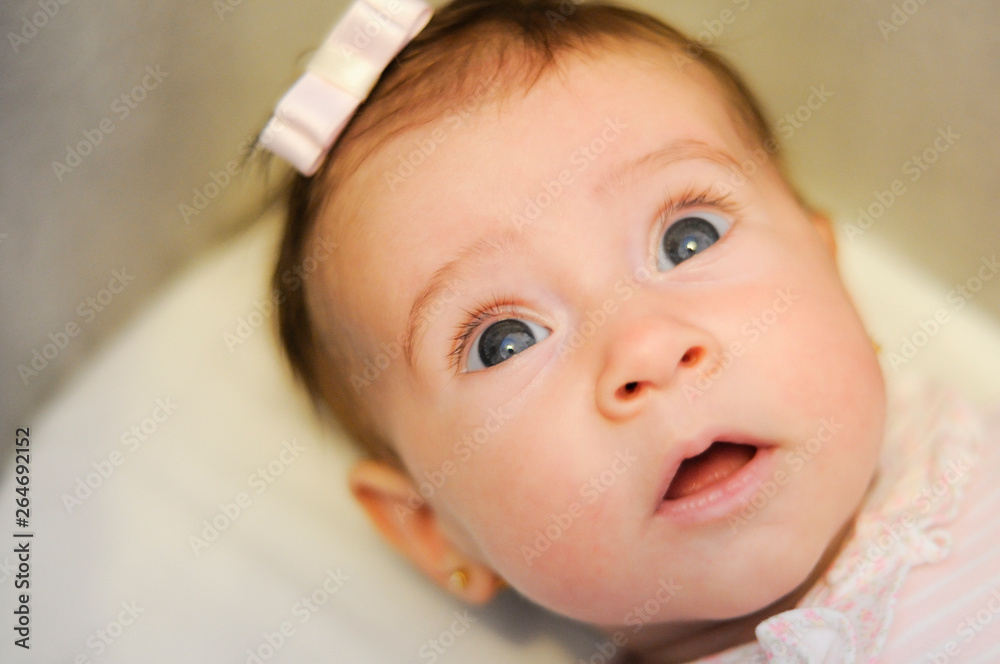 Little baby girl with surprise expression on her face Little baby girl with surprise expression on her face