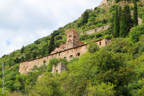 View to the Pantanassa Monastery surrounded by ruins of abandoned byzantine town Mystras, Greece