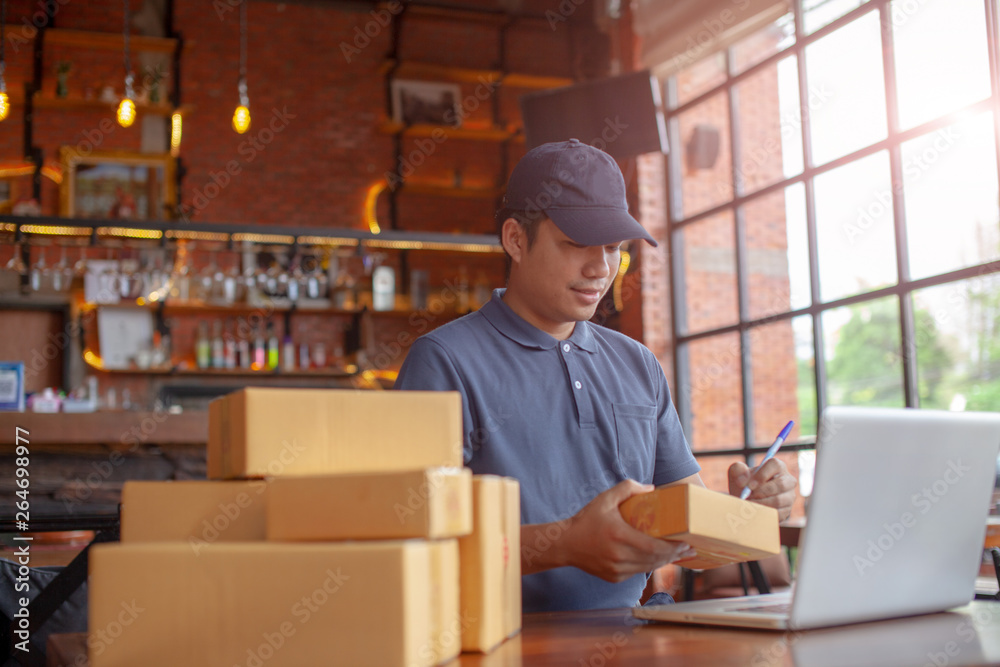 Online shopping young start small business in a cardboard box at work. The seller are preparing products to deliver to their customers, online sales, or ecommerce. Online shopping young start small business in a cardboard box at work. The seller are preparing products to deliver to their customers, online sales, or ecommerce.