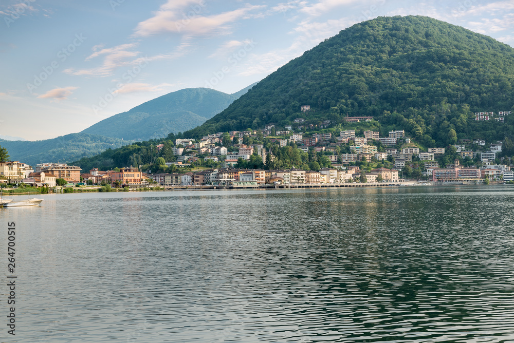 Lake Lugano with the customs bridge between Lavena Ponte Tresa on the left in Italy and Ponte Tresa on the right in Switzerland. Border between Italy and Switzerland