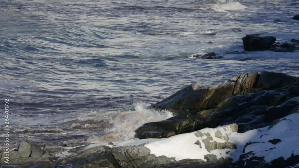 Detail of waves crushing on rocks. Lofoten Islands Norway beach Detail of waves crushing on rocks. Lofoten Islands Norway beach