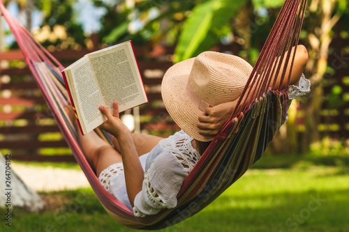 Konstfotografi Beautiful woman relaxing in hammock.