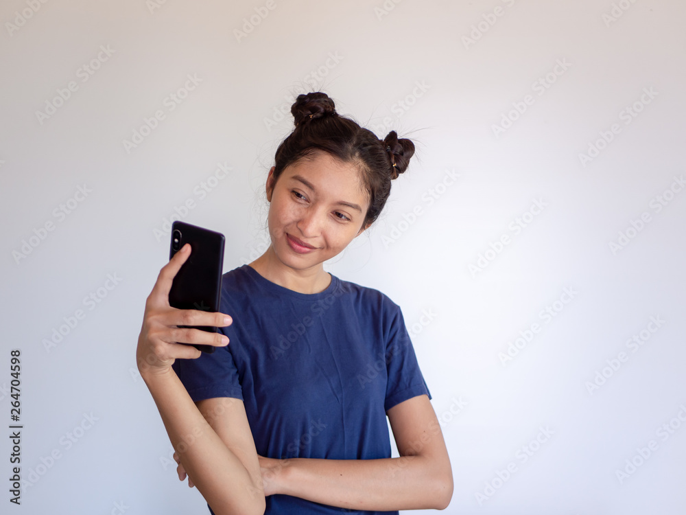 Young asia woman calling with cell telephone over white background Young asia woman calling with cell telephone over white background