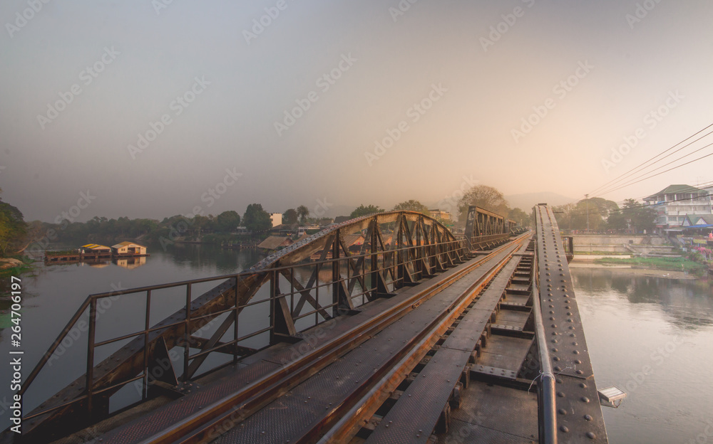 Historical bridge over the river Kwai on sky background