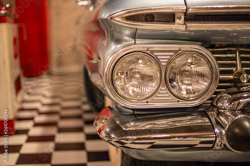 headlight of modern prestigious car close up. color vintage concept.