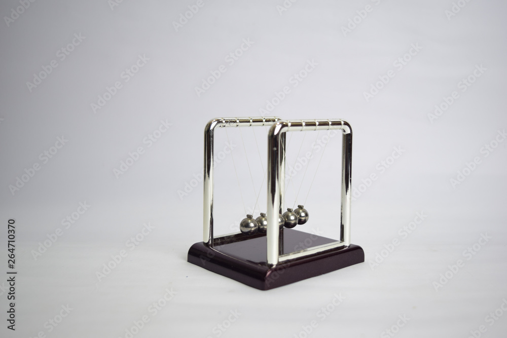 Newton's cradle work. Education, science and physics concept isolated white background