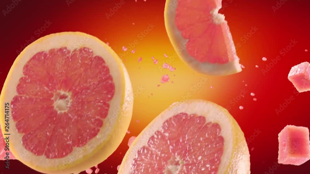 Grapefruit with Slices Falling on Red Background Grapefruit with Slices Falling on Red Background