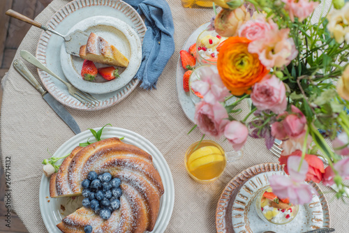 Pastry table flower arrangement over top