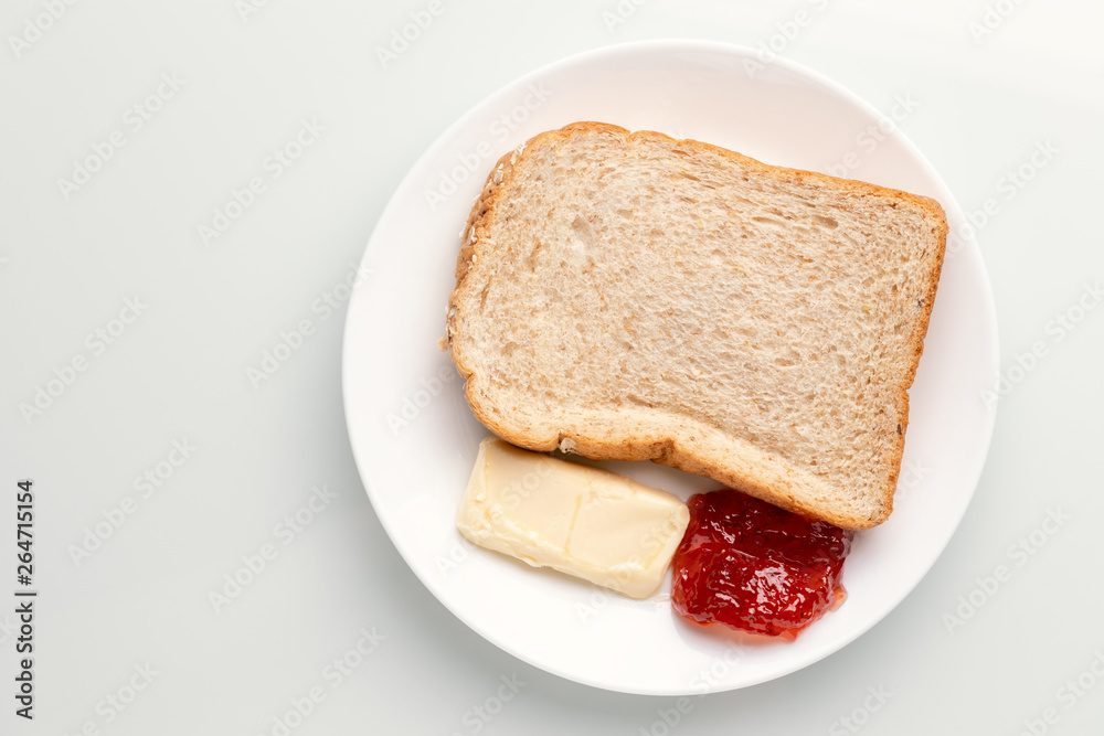 whole wheat bread, butter and jam for breakfast whole wheat bread, butter and jam for breakfast