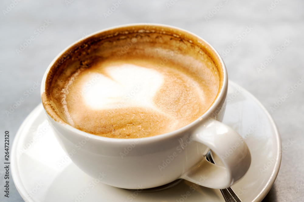 Aromatic latte coffee on the marble table