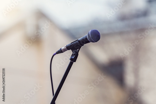 Microphone on the stage on the city square.