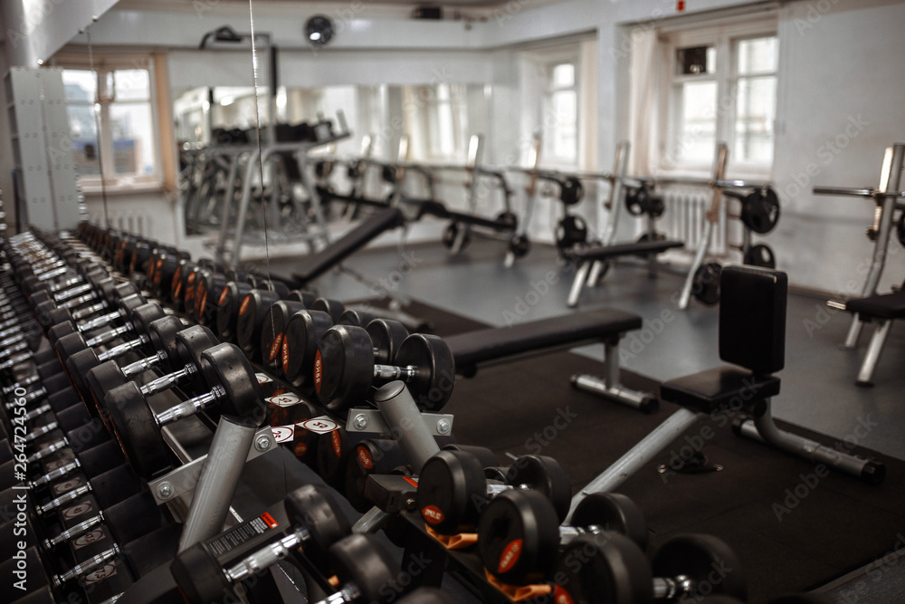 Fototapeta premium Close-up of dumbbells in the gym