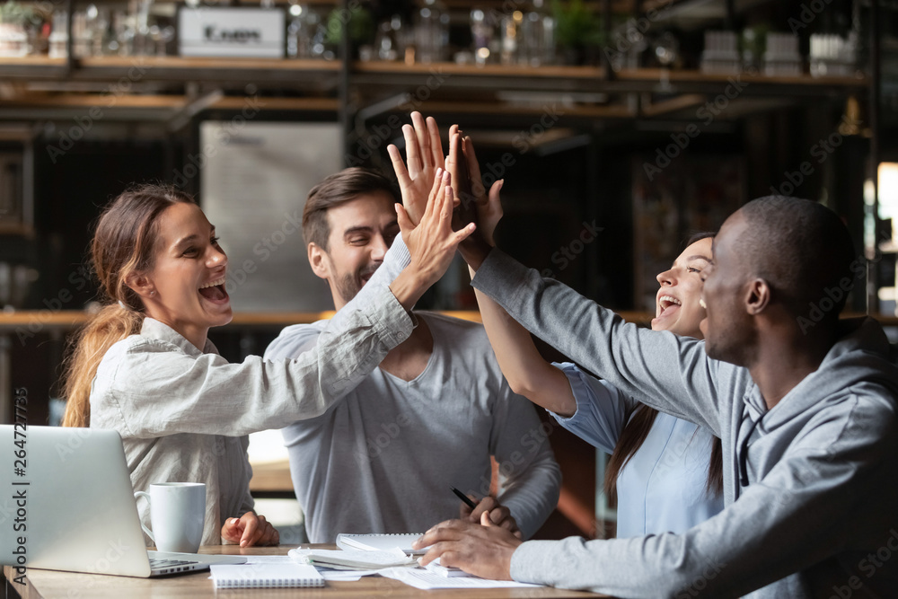 © fizkes - Overjoyed students diverse millennial friends celebrating study finish © fizkes - Overjoyed students diverse millennial friends celebrating study finish