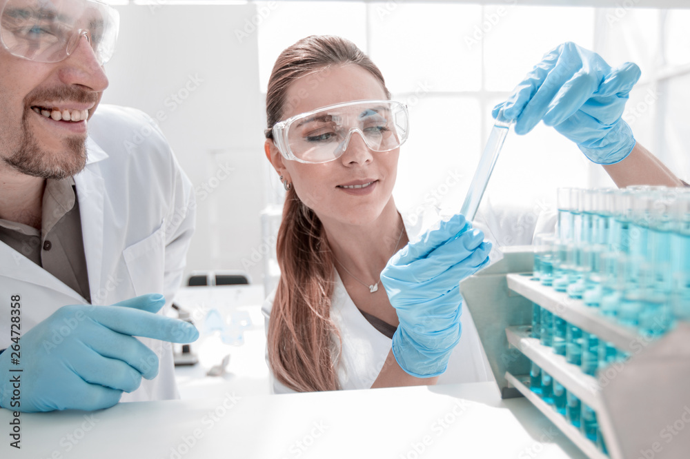 Fototapeta premium two scientists doing tests in the laboratory.