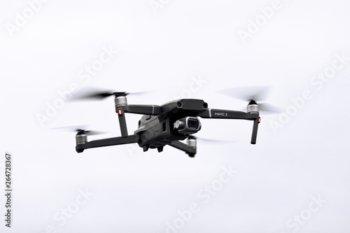 DJI Mavic 2 Pro in flight. DJI Mavic 2 Pro one of the most portable drones in the market, with Hasselblad camera.  photo