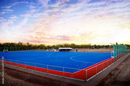 Modern Astroturf   artificial grass hockey field in red and blue