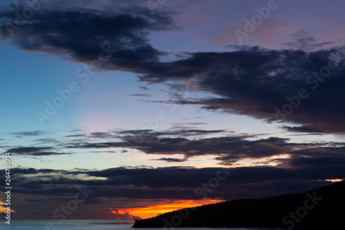 cargo ship at sunset