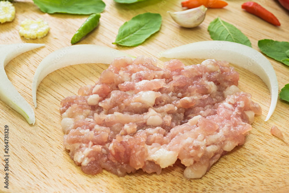 close up of Ingredient of Fried stir basil with minced pork on Wood tray background, selective focus (detailed close-up shot) close up of Ingredient of Fried stir basil with minced pork on Wood tray background, selective focus (detailed close-up shot)