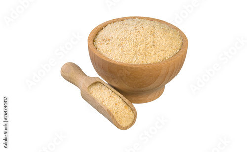 breadcrumbs in wooden bowl and scoop isolated on white background. nutrition. bio. natural food ingredient.