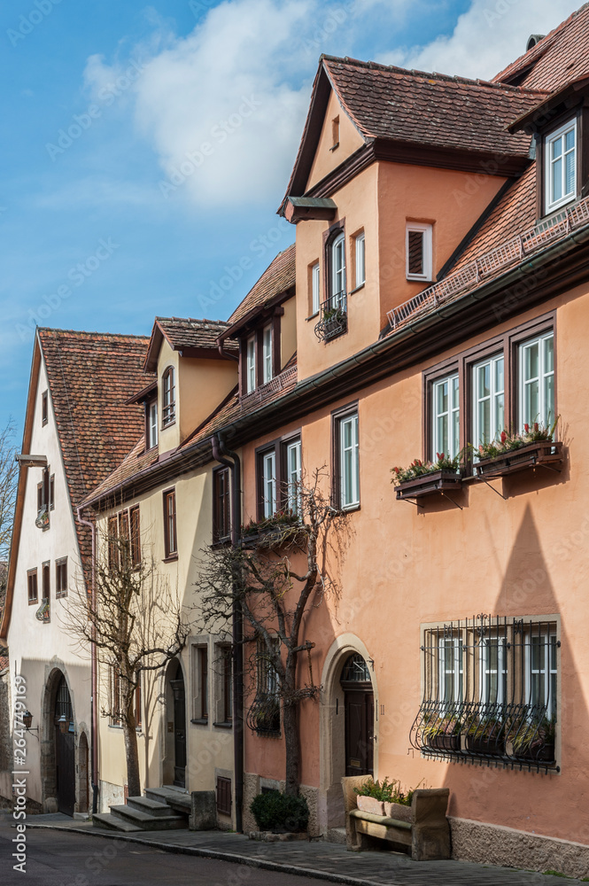 ROTHENBURG OB DER TAUBER, GERMANY -  MARCH 05, 2018: Historic colorful half-timbered houses in the medieval town Rothenburg ob der Tauber, one of the most beautiful villages in Europe, Germany
