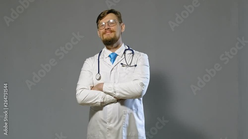 doctor man in white coat on gray background, medicine concept
