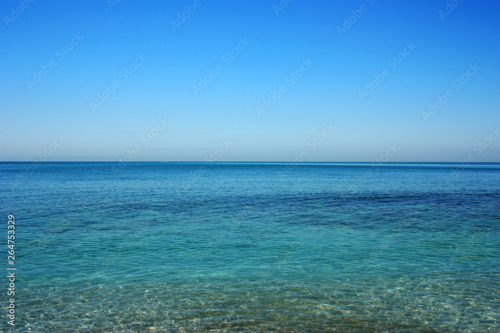 Extensive smooth water surface of the Ligurian Sea