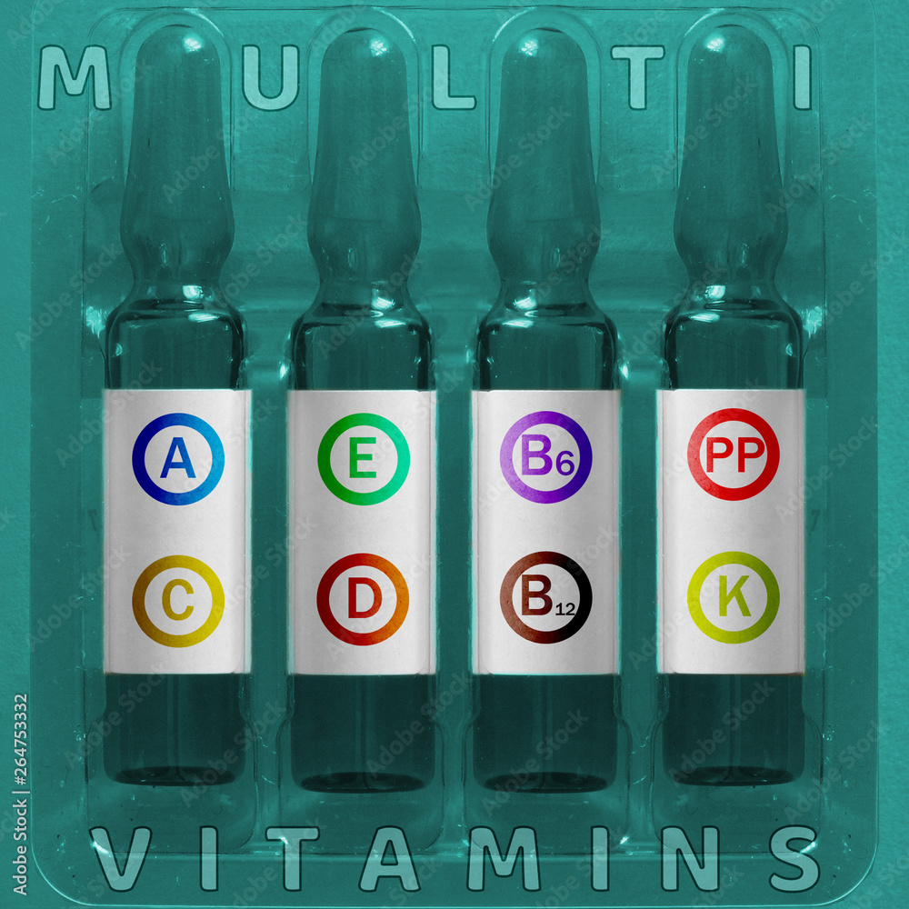 Multivitamins using concept. Four ampules with overlay colored letters of inscription A C E D K PP B6 B12 vitamin elements in circles. Medical ampules of nutrient supplement complex header Multivitamins using concept. Four ampules with overlay colored letters of inscription A C E D K PP B6 B12 vitamin elements in circles. Medical ampules of nutrient supplement complex header