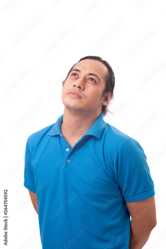 Funny Young Man Thinking Expression, Looking to The Side Funny Young Man Thinking Expression, Looking to The Side