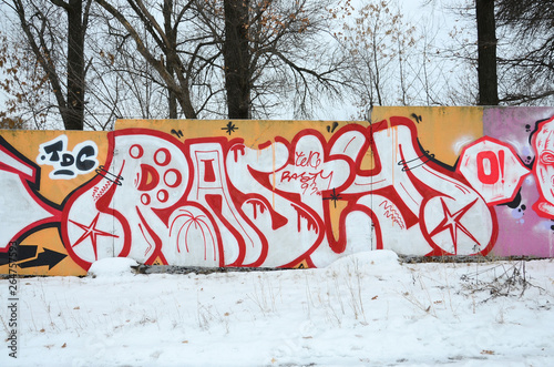 Fragment of colored street art graffiti paintings with contours and shading close up photo