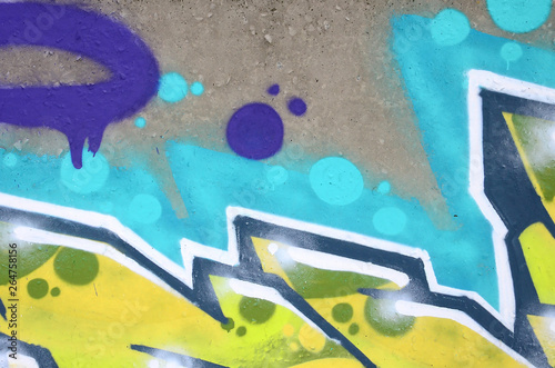 Fragment of colored street art graffiti paintings with contours and shading close up photo