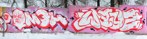 Fragment of colored street art graffiti paintings with contours and shading c...