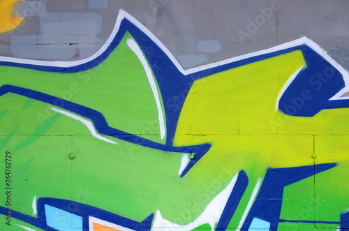 Fragment of colored street art graffiti paintings with contours and shading close up photo