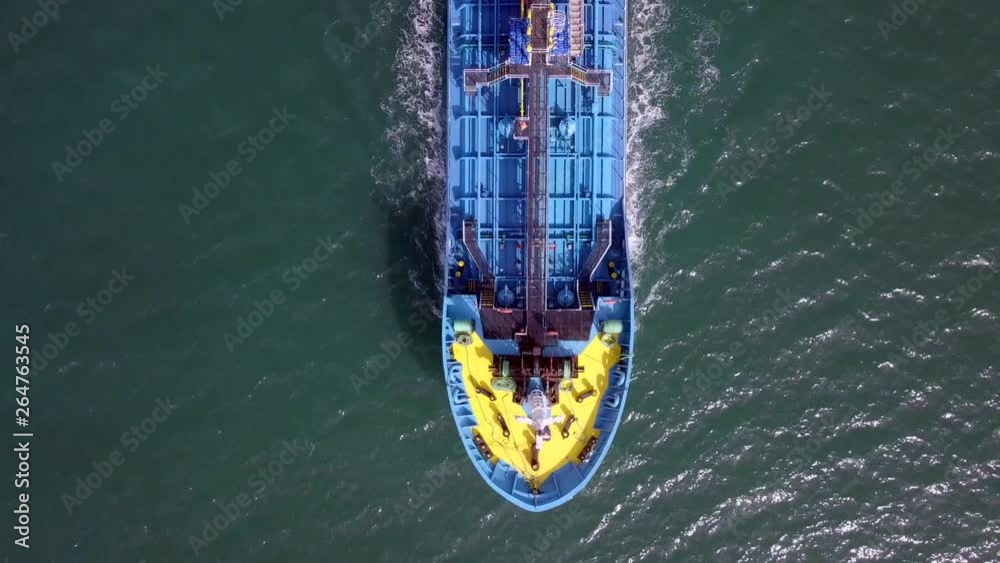 Large crude oil tanker cruising across The Mediterranean sea - Aerial footage following the ship