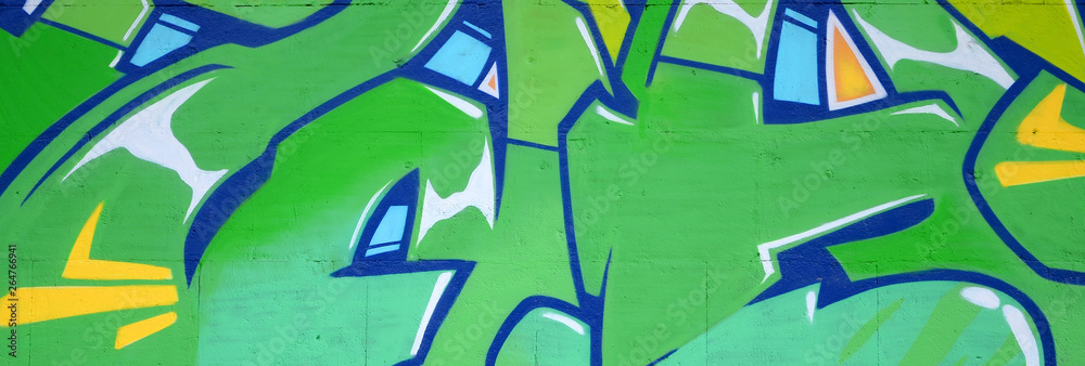 Naklejka premium Fragment of colored street art graffiti paintings with contours and shading close up