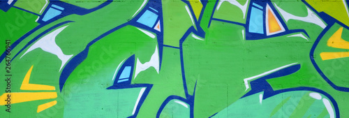 Fragment of colored street art graffiti paintings with contours and shading c...
