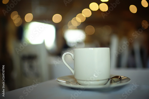 English tea in a cafe   cup and kettle with five o clock tea