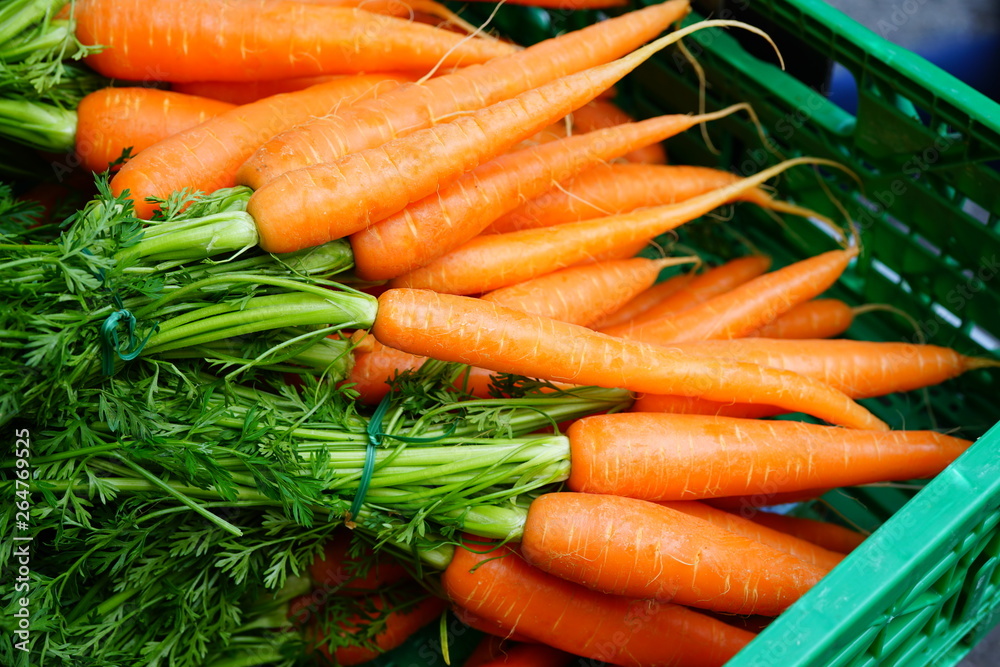 Fresh carrots for sale at a farmers market Fresh carrots for sale at a farmers market