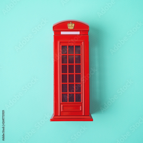 London red telephone booth on blue background. photo