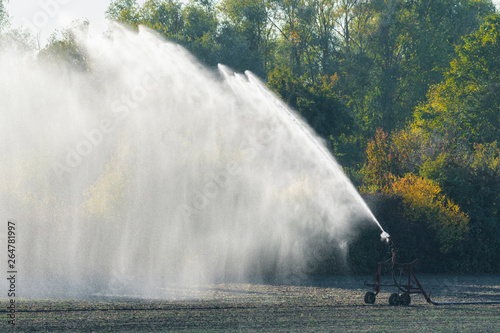 Irrigation system on field, Germany, Europe photo