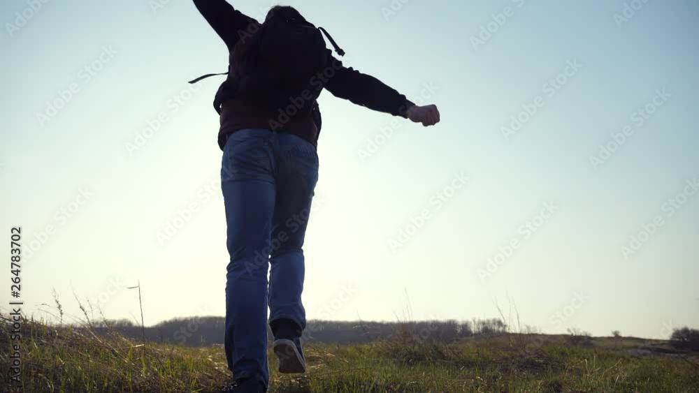 teamwork happiness business travel silhouette concept. group hikers of people happy run and jump slow motion video walking in a field on trekking trip. tourists lifestyle with backpacks traveling teamwork happiness business travel silhouette concept. group hikers of people happy run and jump slow motion video walking in a field on trekking trip. tourists lifestyle with backpacks traveling
