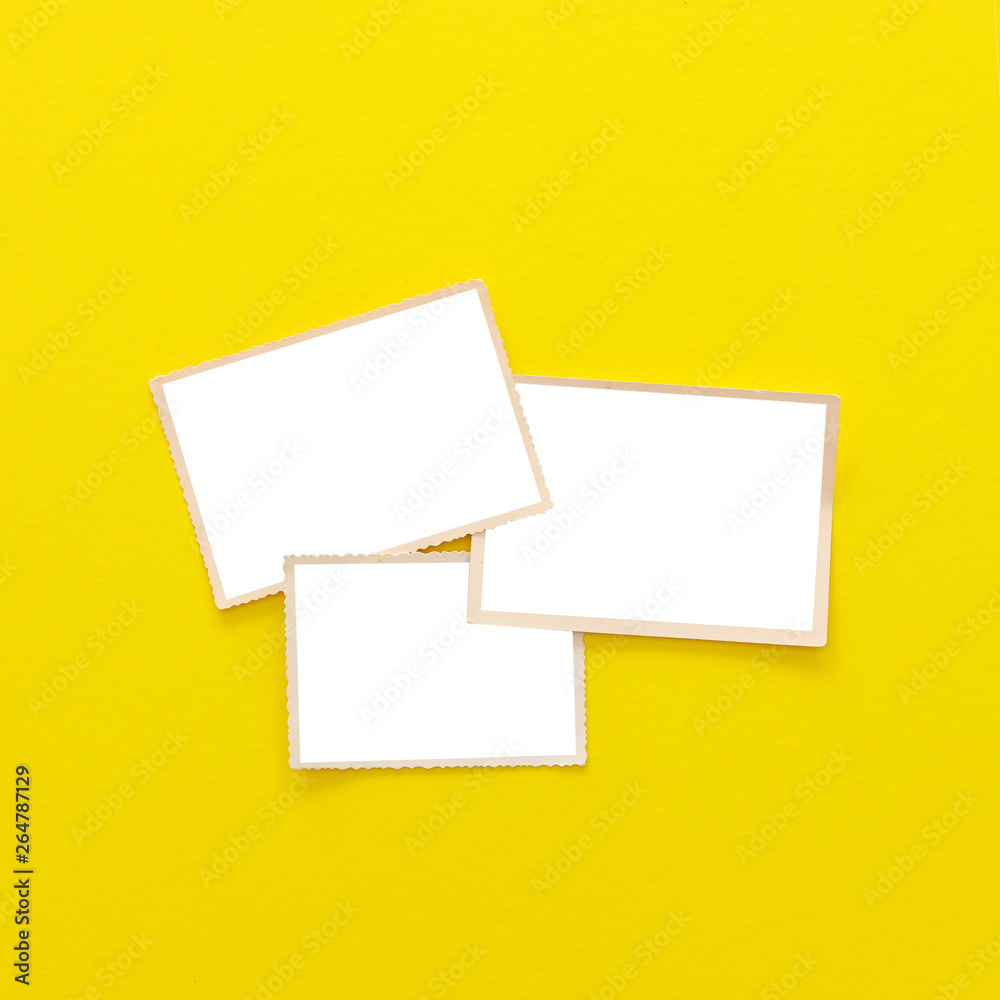 top view of blank photo frames over yellow background. Top view flat lay top view of blank photo frames over yellow background. Top view flat lay