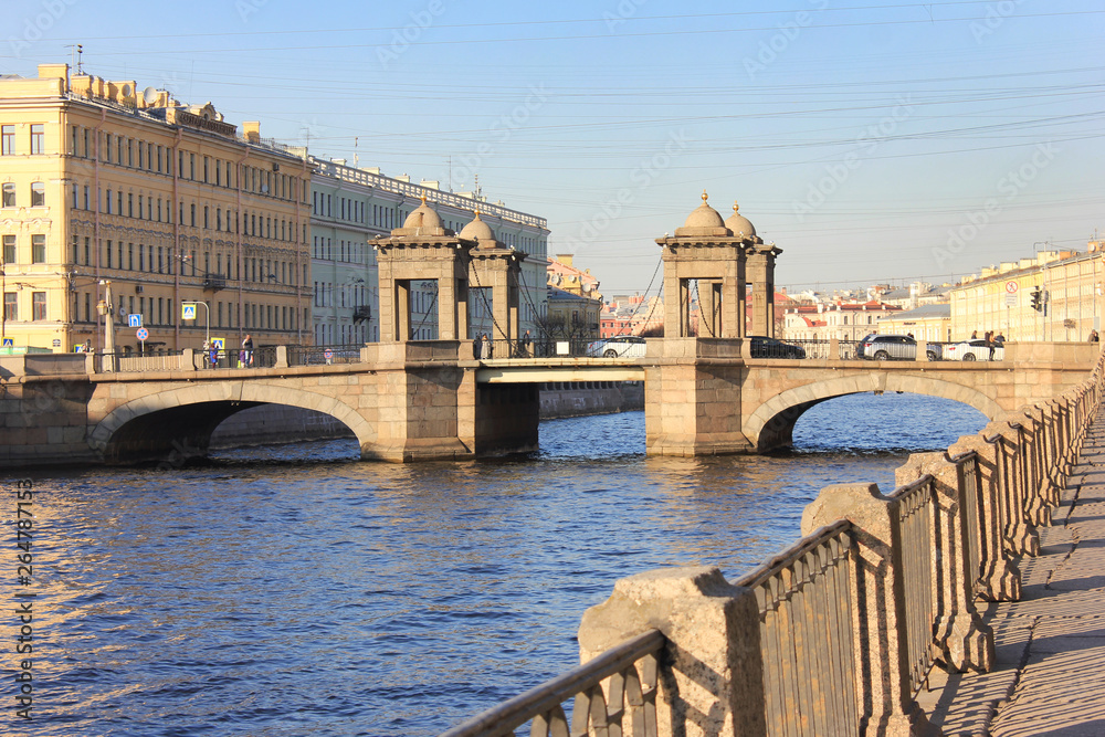 Lomonosov Bridge in Saint Petersburg, Russia. Historical cityscape with towered movable bridge, build in 18th century on sunny summer day 