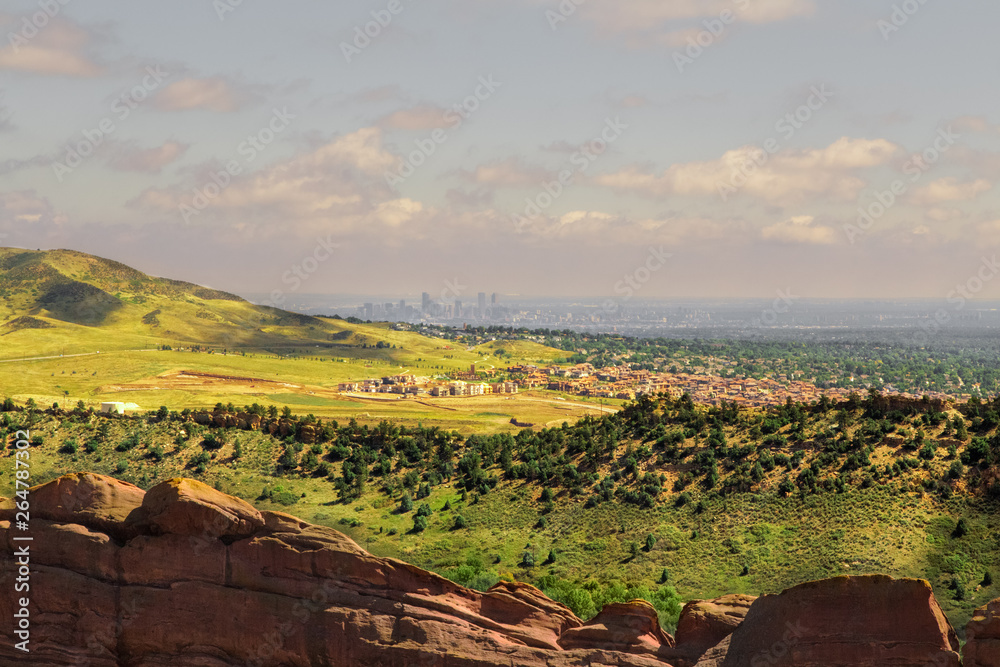 Panoramic view of Denver From Red Rocks Amphitheater,Colorado.USA. Pink clouds blue sky.